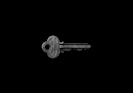 photo of key against black background