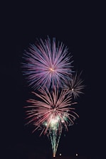 purple and red fireworks time lapse photography