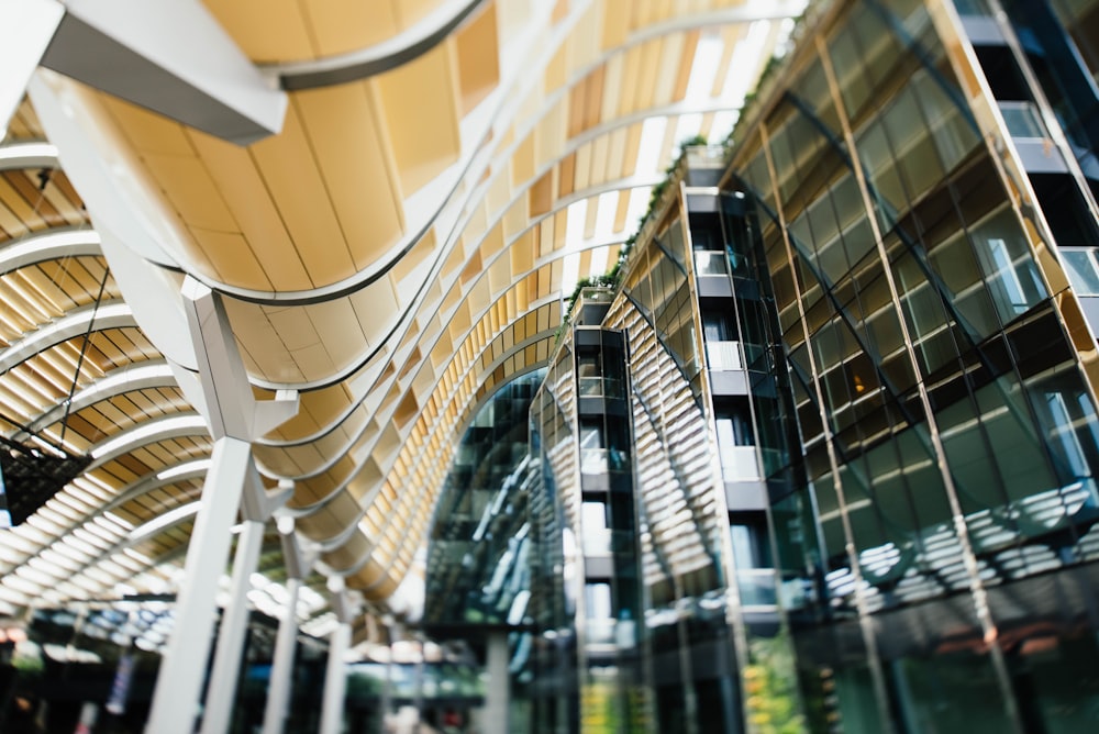 low angle photography of glass high rise buildings