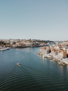 bird's eye view photography of boat on body of water