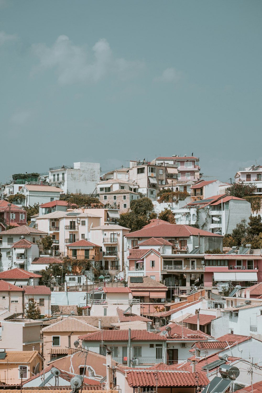 village under cloudy sky during daytime