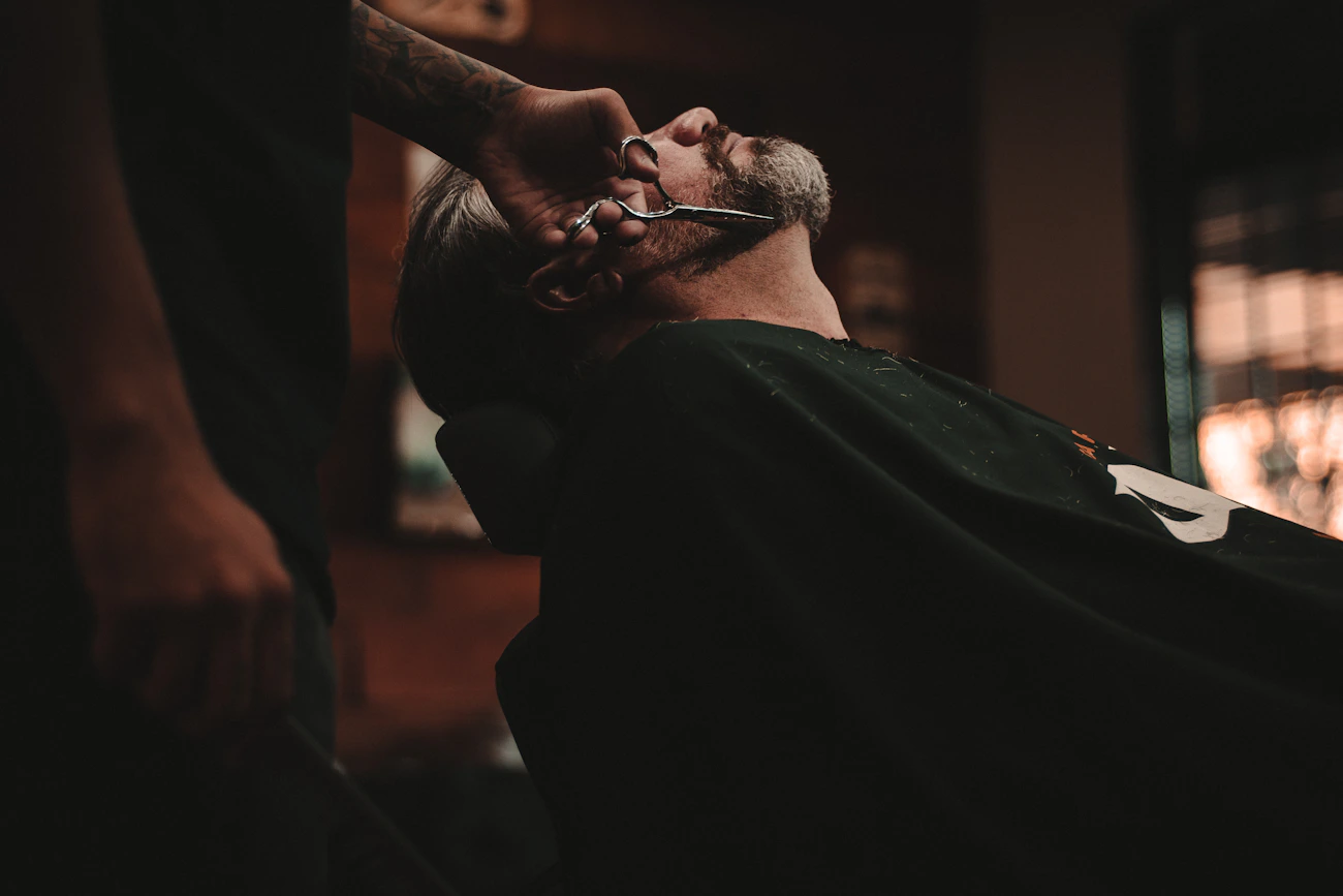 Barber finishing a clean hairstyle
