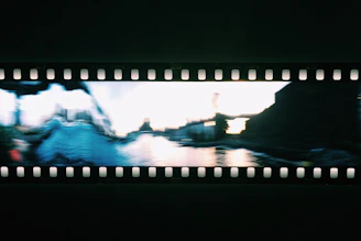 Placeholder image showing a black-bordered rectangular block representing cityscape background art with a small label tab reading 'background art' in the top-left corner and a light gray credit box in the bottom-right.