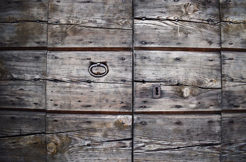 closed brown wooden doors