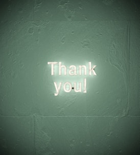 A clean computer screen displaying a modern 'Thank You' webpage with soft blue and green tones.