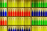 An assortment of colorful water bottles arranged aesthetically.