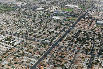 Illustration of a neighborhood with homes connected by a network symbolizing pooled home values