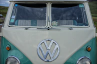 A close-up of the white VW T5 California Beach’s dashboard showing its classic, used charm.