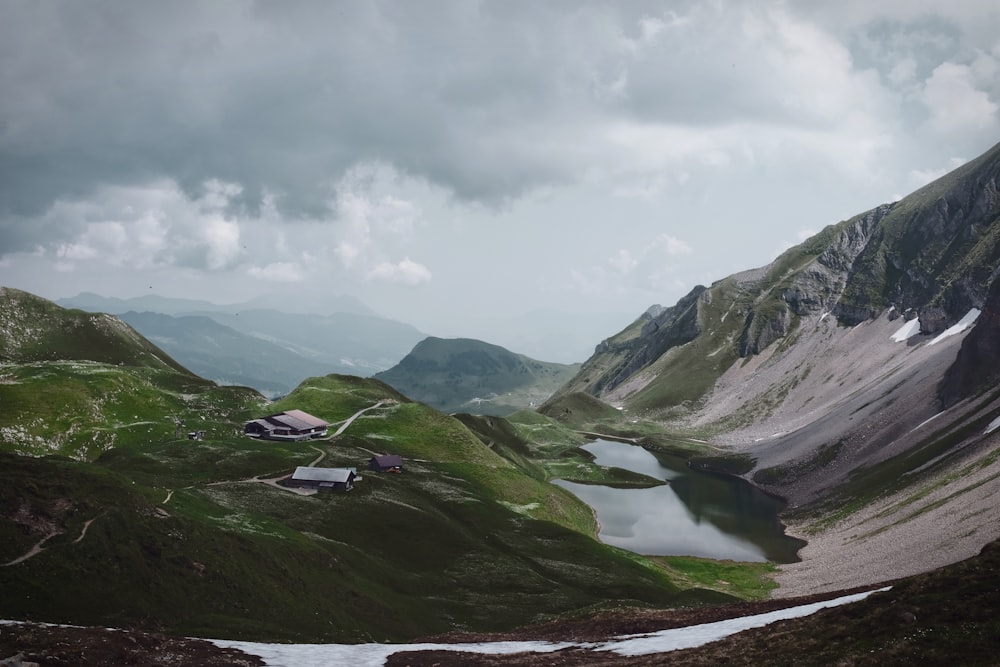 mountain beside body of water