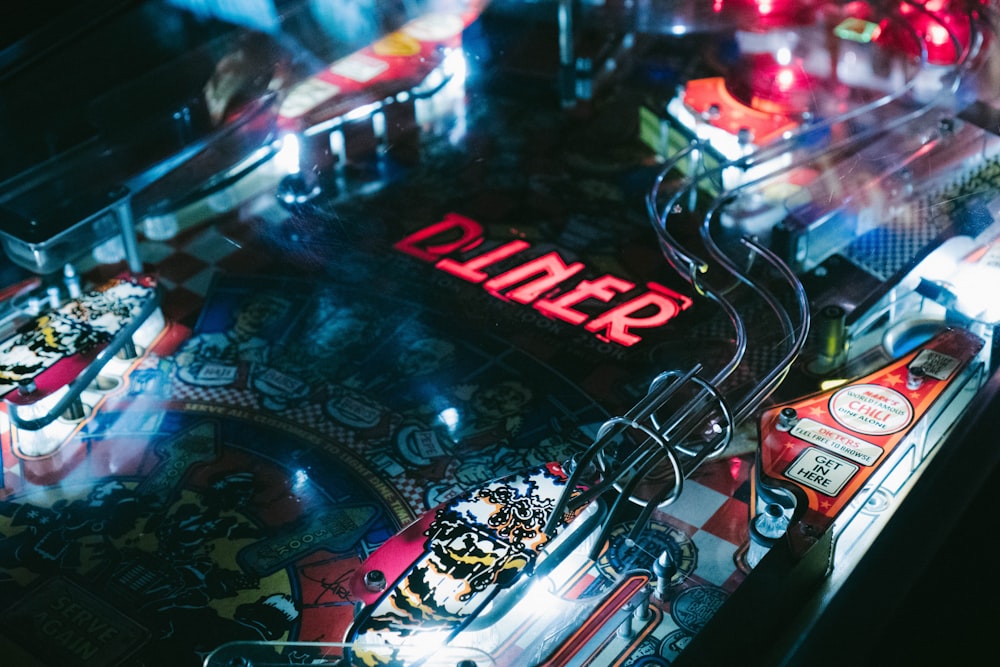 closeup photo of black and yellow pinball machine