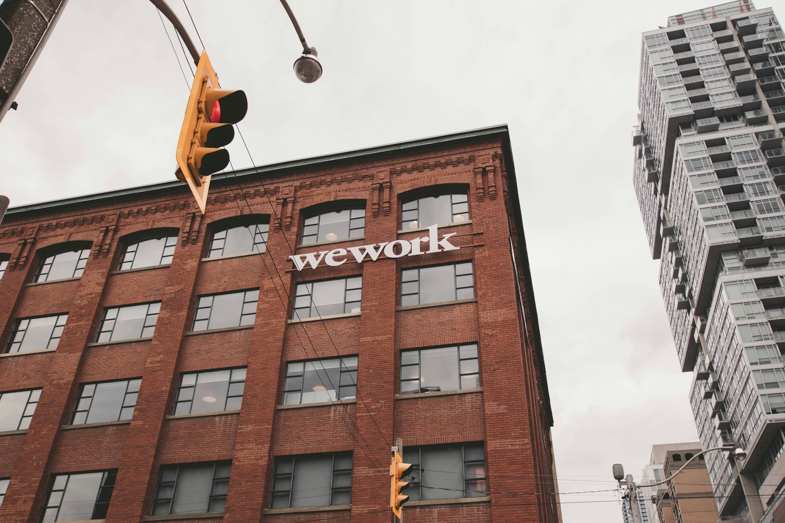 Sigma 10-20mm F3.5 EX DC HSM sample photo. Wework building beside traffic photography