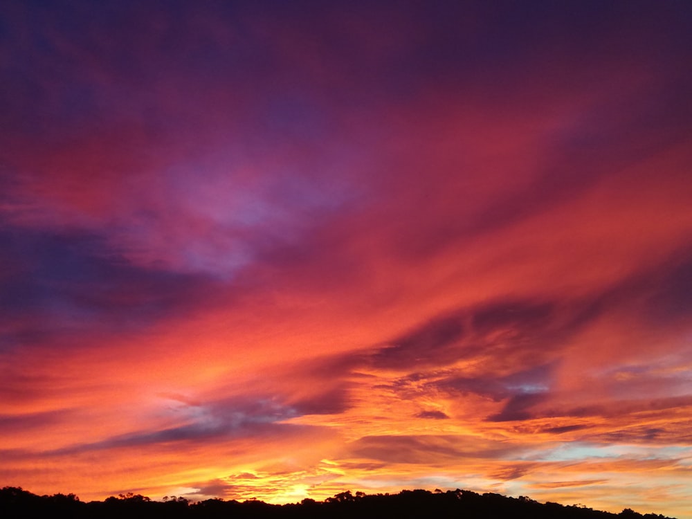 photo of clouds during golden hour