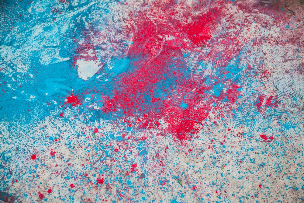 red and multicolored paint splatters