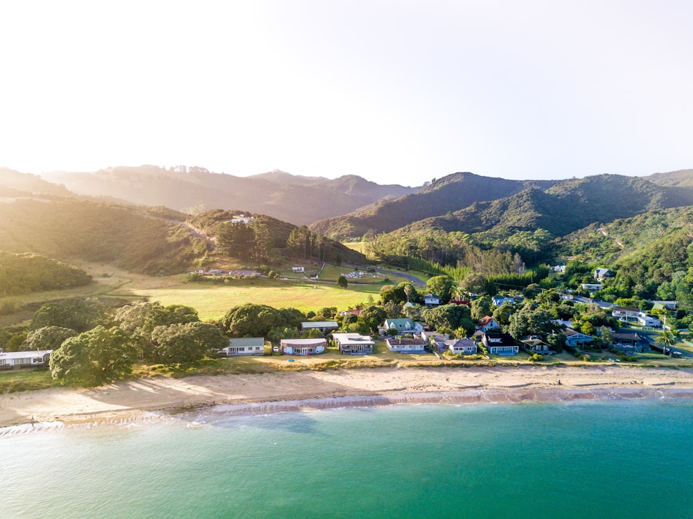 bird's eye view of body of water near mountain