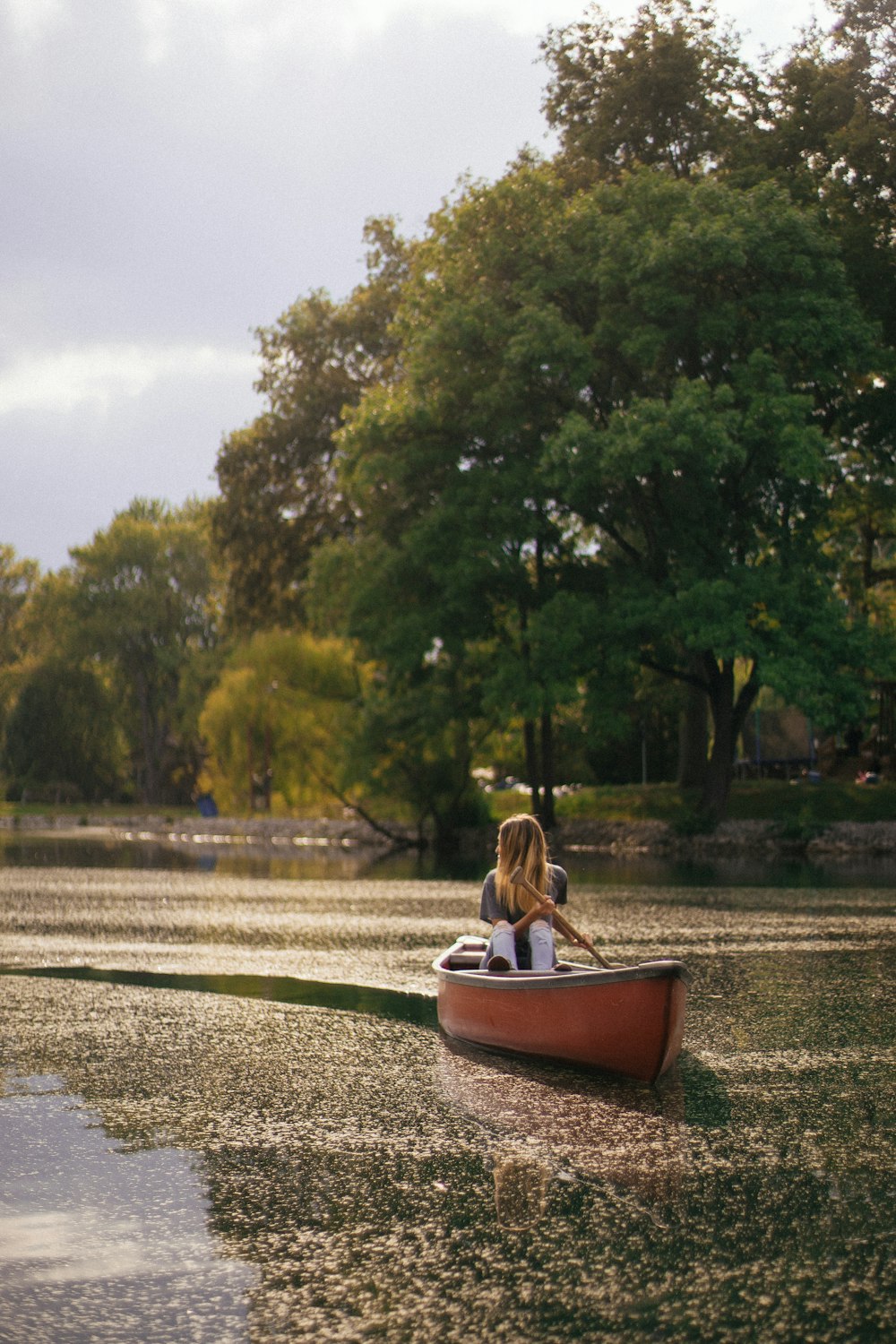 woman riding on boat