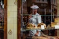 baker inside glass covered store