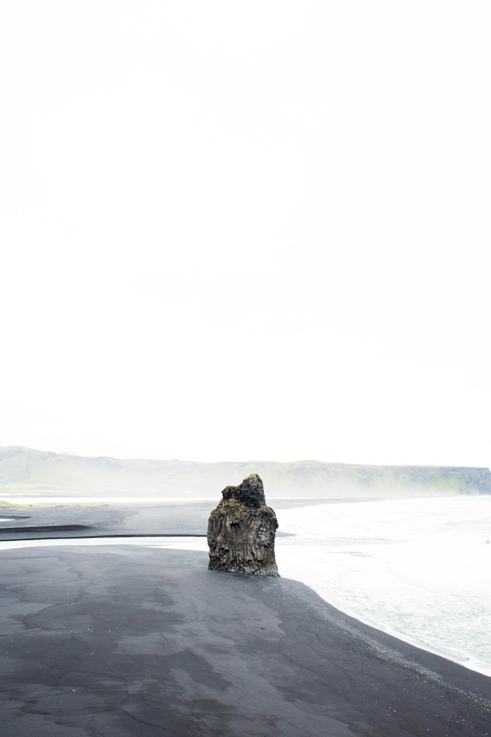 grey scale photo of brown rock