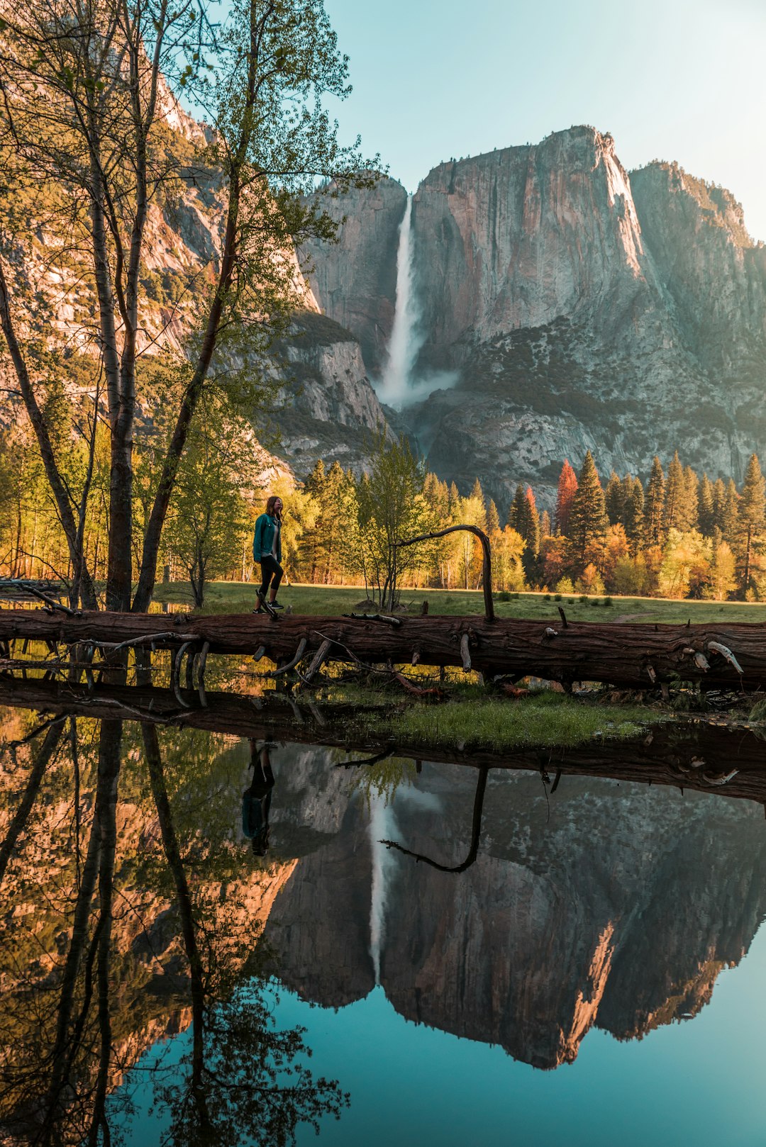 person walking near body of water