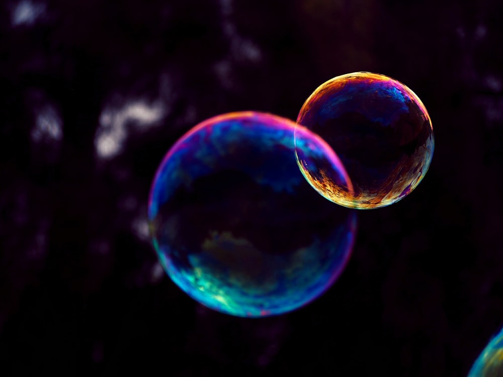 closeup photo of two bubbles