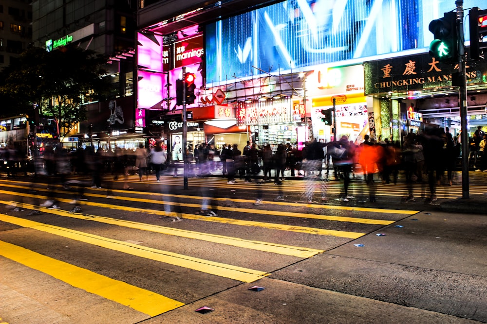 group of people passing alongpedestrian lane