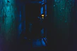 Smart lock with fingerprint scanner glowing softly in a dimly lit hallway