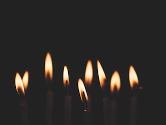 photo of lit candles