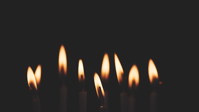 photo of lit candles