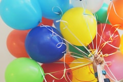 person holding balloons