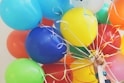 person holding balloons