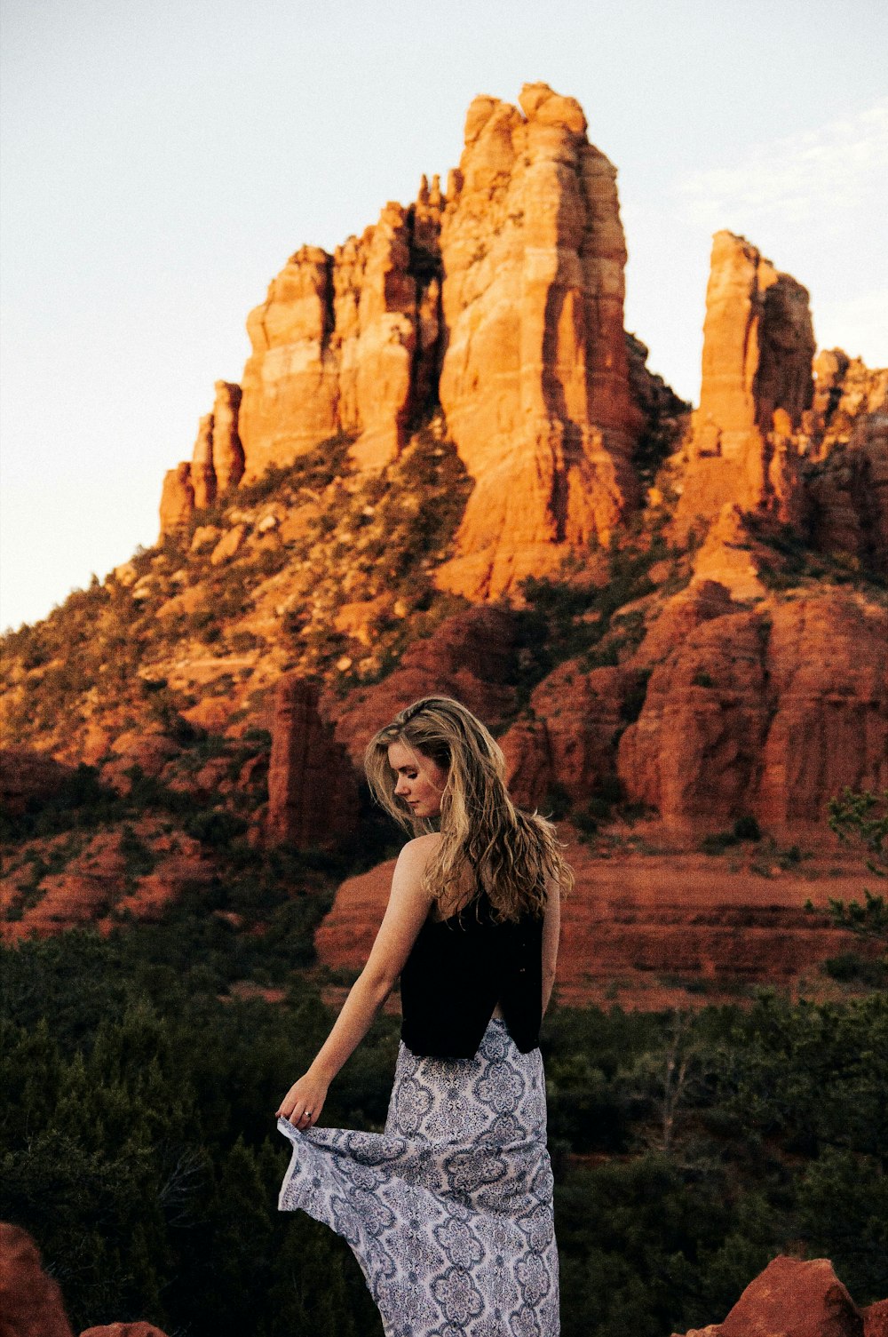 woman wearing black and gray sleeveless dress