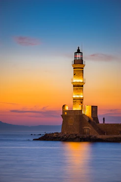 brown lighthouse during golden hour