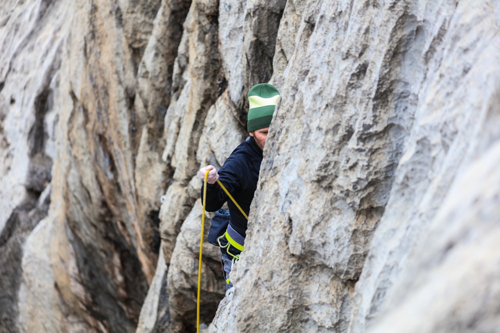 man doing wall climb activity