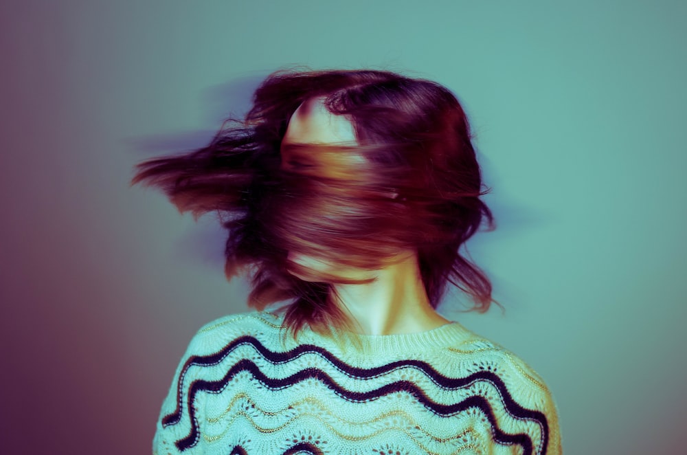 woman flipping her hair