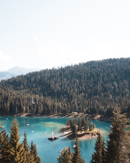 aerial photography of body of water in Caumasee Lake Switzerland