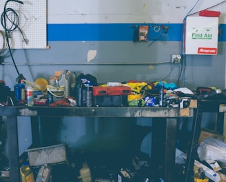 assorted-color handheld tools on work bench