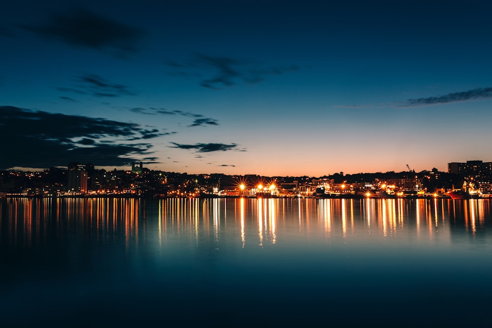 buildings and body of water