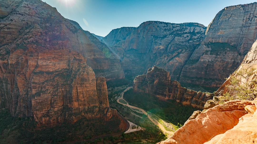 brown and black rugged mountain at daytime, Zion Valley from Angel’s Landing
