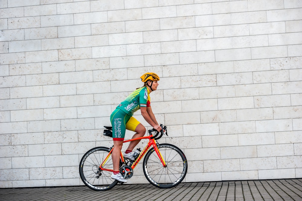 woman on red bicycle