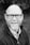 grayscale of man wearing eyeglasses