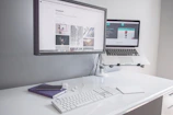 A minimalist workspace featuring a desktop showing diginest’s clean website interface.