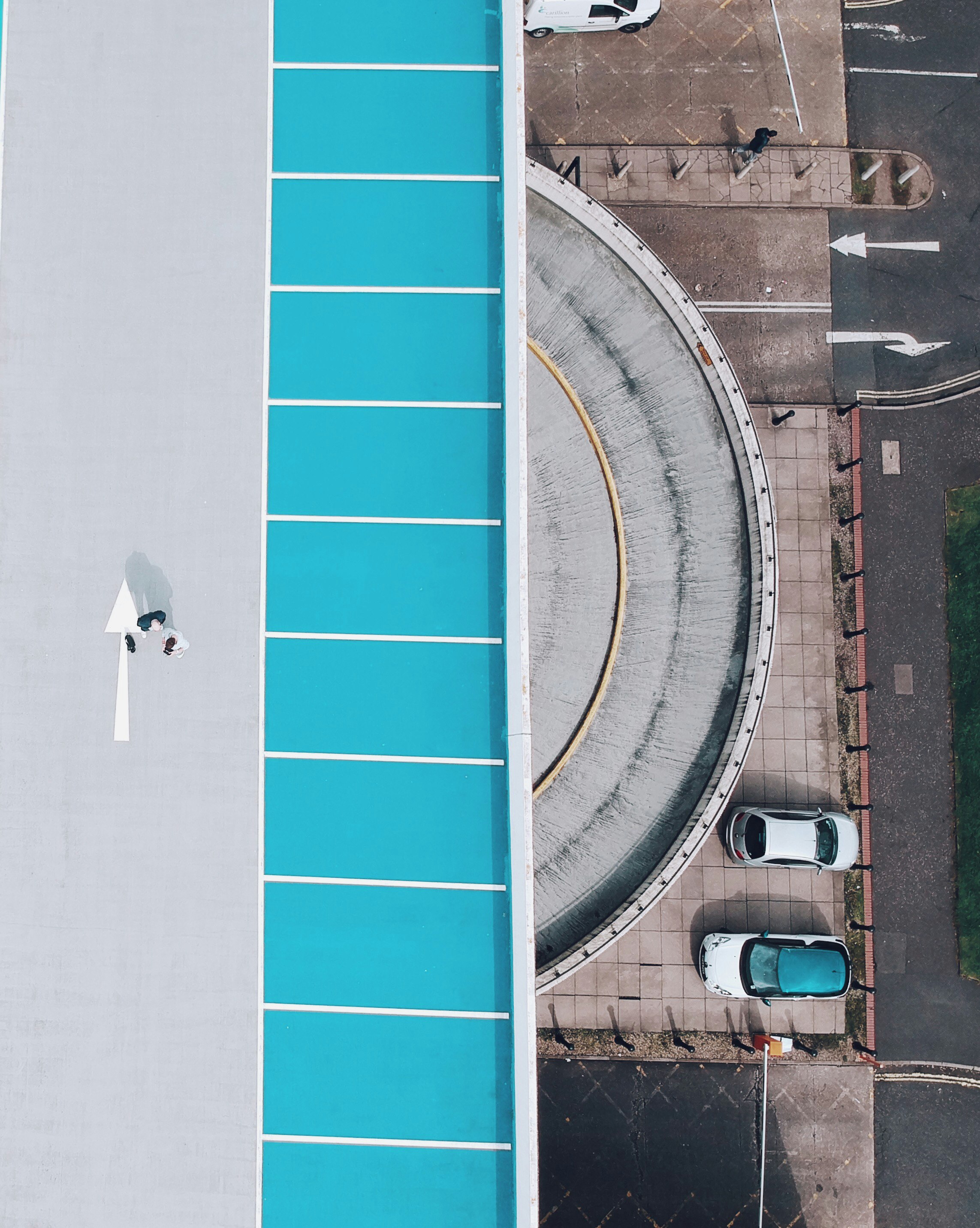 bird's eye photography of two cars parked near dome