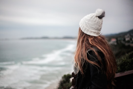 woman facing body of water in Knysna South Africa