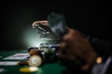 selective focus photography of poker chips