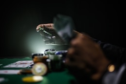 selective focus photography of poker chips