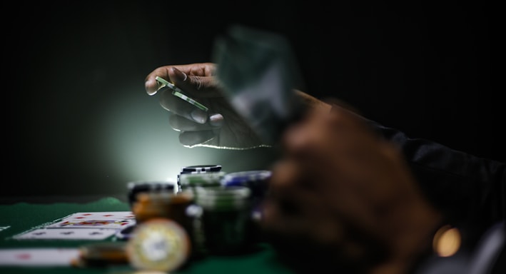 selective focus photography of poker chips