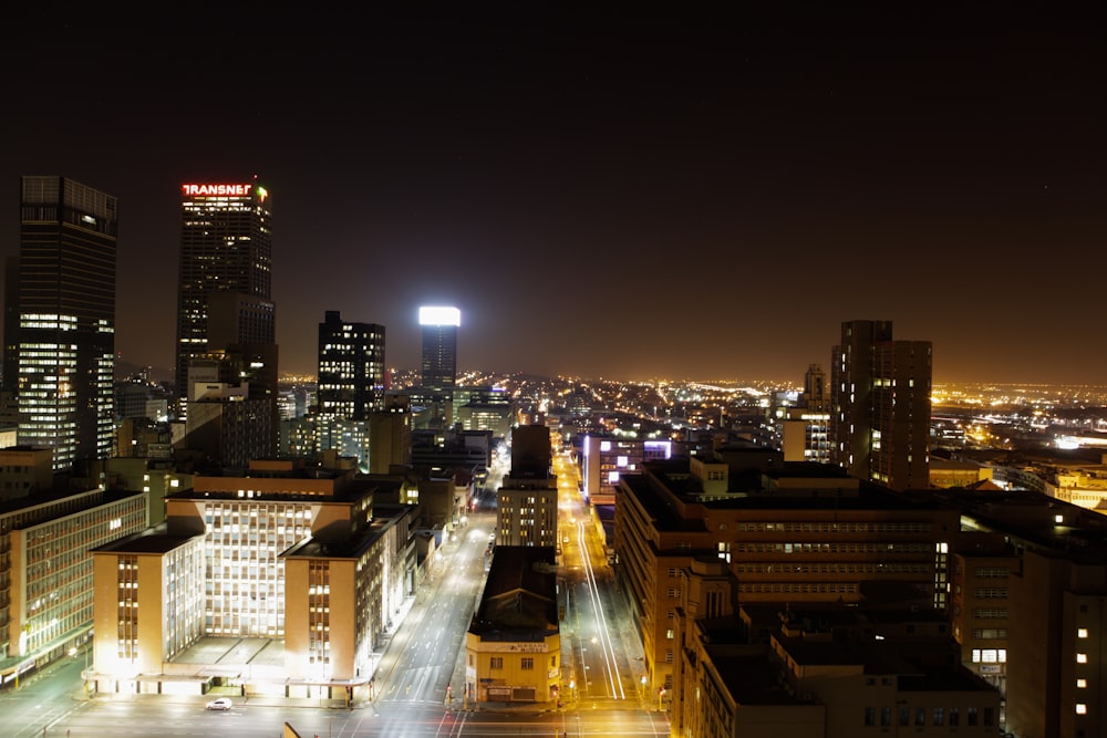 A busy, heavily lit cityscape.