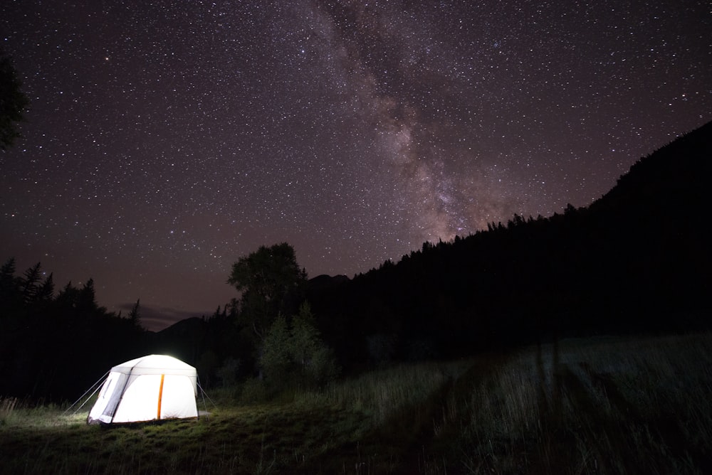 white canopy tent near mountain