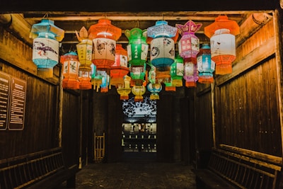 photo of assorted-color Chinese lanterns inside room