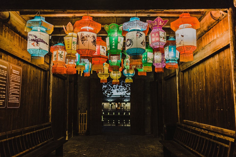 photo of assorted-color Chinese lanterns inside room