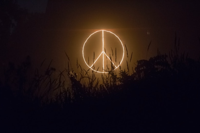 Peace sign logo neon signage